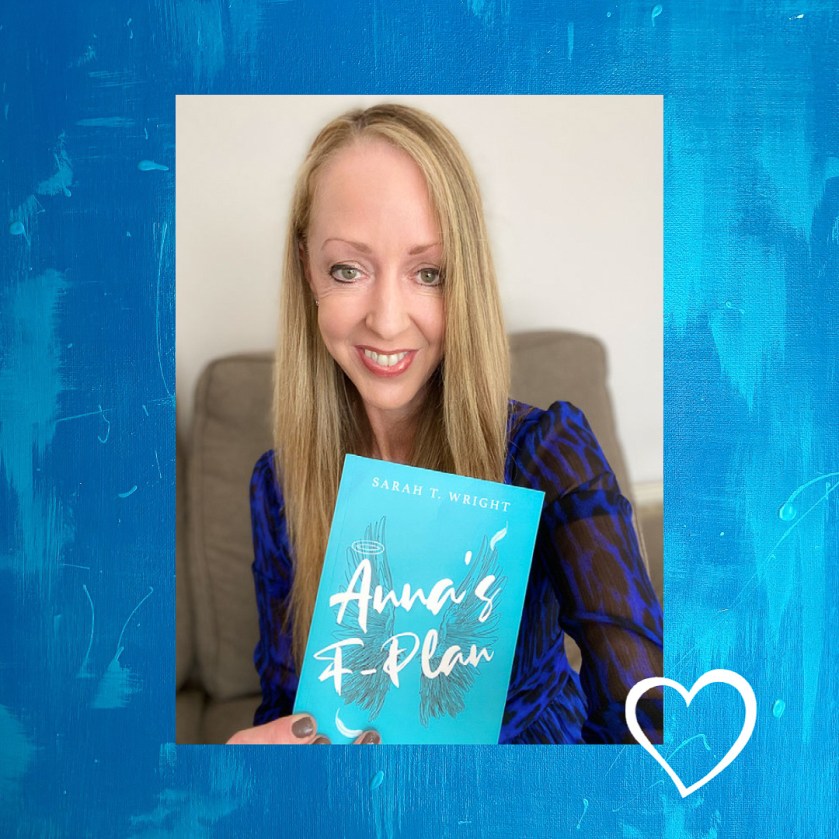 Author Sarah T. Wright holding Anna's F-Plan book