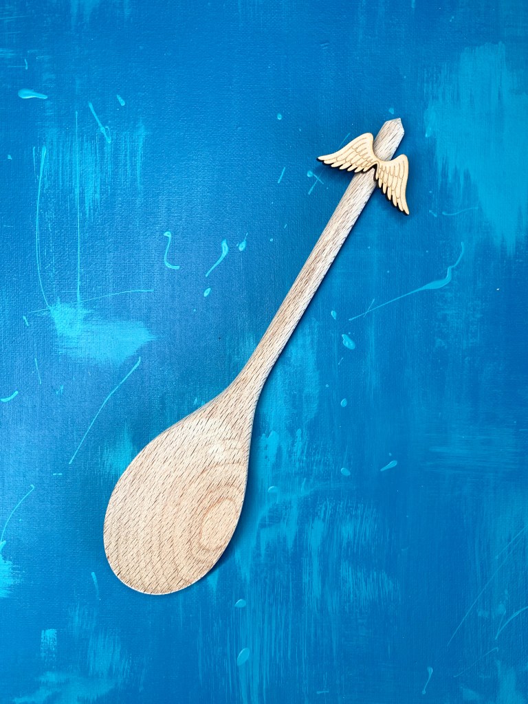 Wooden spoon with angel wings